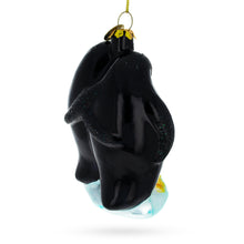 Load image into Gallery viewer, Penguins with Baby Chick Glass Christmas Ornament