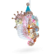 Load image into Gallery viewer, Santa Riding Seahorse Glass Christmas Ornament