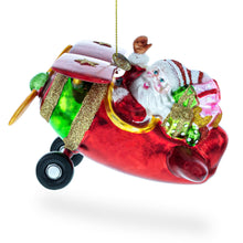 Load image into Gallery viewer, Santa Flying Airplane with Gifts Glass Christmas Ornament