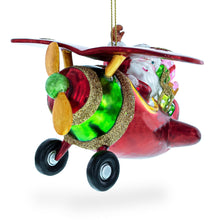 Load image into Gallery viewer, Santa Flying Airplane with Gifts Glass Christmas Ornament