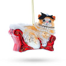 Load image into Gallery viewer, Cat in Pearl Necklace Lounging on Sofa Glass Christmas Ornament