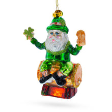 Load image into Gallery viewer, Irish Santa Sitting on a Whiskey Barrel Glass Christmas Ornament
