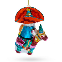 Load image into Gallery viewer, Santa Riding a Festive Pinata Glass Christmas Ornament