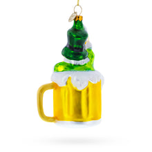 Load image into Gallery viewer, Leprechaun Lounging in a Beer Mug Glass Christmas Ornament