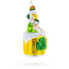 Load image into Gallery viewer, Leprechaun Lounging in a Beer Mug Glass Christmas Ornament
