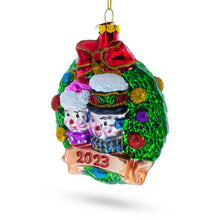 Load image into Gallery viewer, 2023 Snowmen Couple in Wreath Glass Christmas Ornament