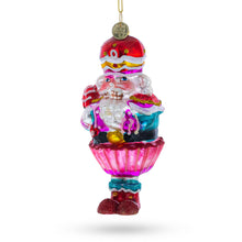 Load image into Gallery viewer, Nutcracker with Cupcake Glass Christmas Ornament
