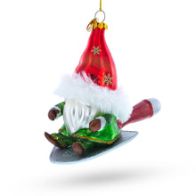 Load image into Gallery viewer, Scandinavian Gnome Riding a Shield Glass Christmas Ornament