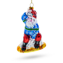 Load image into Gallery viewer, Snowboarding Santa Glass Christmas Ornament