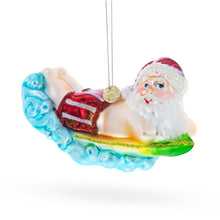 Load image into Gallery viewer, Surfing Santa Glass Christmas Ornament