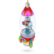 Load image into Gallery viewer, Trailblazing Astronaut Inside Spaceship Glass Christmas Ornament