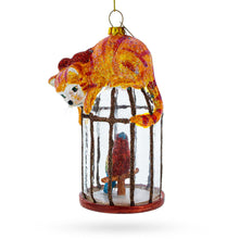 Load image into Gallery viewer, Cat on Birdcage with Parrot Glass Christmas Ornament