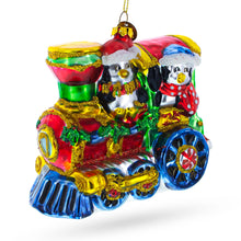 Load image into Gallery viewer, Playful Penguins Riding Train Glass Christmas Ornament