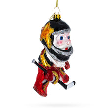 Load image into Gallery viewer, Santa in Ice Hockey Gear Glass Christmas Ornament