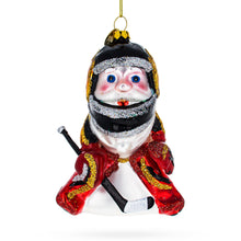 Load image into Gallery viewer, Santa in Ice Hockey Gear Glass Christmas Ornament