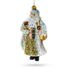 Load image into Gallery viewer, Glittered Santa Holding a Magical Lantern Glass Christmas Ornament