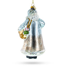 Load image into Gallery viewer, Glittered Santa Holding a Magical Lantern Glass Christmas Ornament