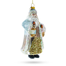 Load image into Gallery viewer, Glittered Santa Holding a Magical Lantern Glass Christmas Ornament