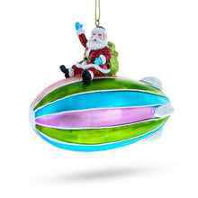 Load image into Gallery viewer, Santa Flying on Zeppelin Blimp Glass Christmas Ornament