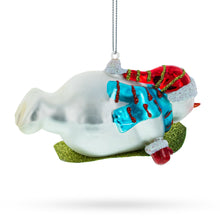 Load image into Gallery viewer, Snowman Gleefully Riding a Sled Glass Christmas Ornament