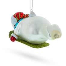 Load image into Gallery viewer, Snowman Gleefully Riding a Sled Glass Christmas Ornament