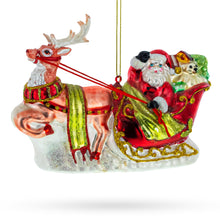 Load image into Gallery viewer, Santa’s Sleigh Ride with Reindeer Glass Christmas Ornament