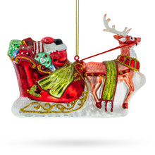 Load image into Gallery viewer, Santa’s Sleigh Ride with Reindeer Glass Christmas Ornament