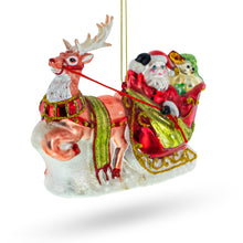 Load image into Gallery viewer, Santa’s Sleigh Ride with Reindeer Glass Christmas Ornament