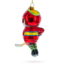 Load image into Gallery viewer, Snowman Playing Hockey Glass Christmas Ornament