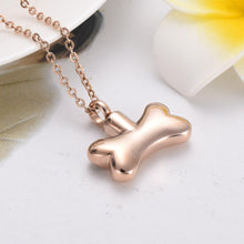 Load image into Gallery viewer, Dog Bone With Paw Print Cremation Urn Necklace