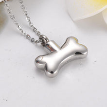 Load image into Gallery viewer, Dog Bone With Paw Print Cremation Urn Necklace