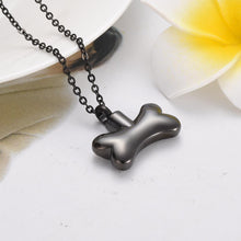 Load image into Gallery viewer, Dog Bone With Paw Print Cremation Urn Necklace
