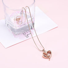 Load image into Gallery viewer, Paw Print In Heart Pet Cremation Urn Necklace