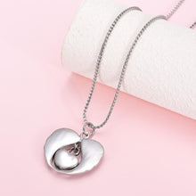 Load image into Gallery viewer, Silver Angel Wings Heart Paw Print Cremation Urn Necklace