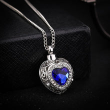 Load image into Gallery viewer, Silver Heart Shaped Cremation Urn Necklace with Rhinestones and Blue Gem
