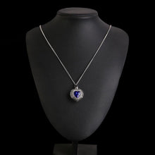 Load image into Gallery viewer, Silver Heart Shaped Cremation Urn Necklace with Rhinestones and Blue Gem