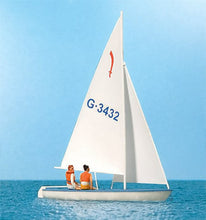 Load image into Gallery viewer, Preiser 10676 HO Scale Korsar Sailboat w/Sailor -- Sails Up (white, red, blue)