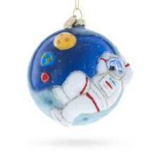 Load image into Gallery viewer, Astronaut on a Moon Glass Christmas Ornament