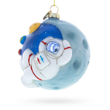 Load image into Gallery viewer, Astronaut on a Moon Glass Christmas Ornament