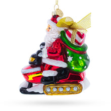 Load image into Gallery viewer, Santa on Snowmobile Glass Christmas Ornament