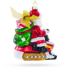 Load image into Gallery viewer, Santa on Snowmobile Glass Christmas Ornament