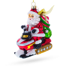Load image into Gallery viewer, Santa on Snowmobile Glass Christmas Ornament