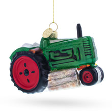 Load image into Gallery viewer, Green Tractor with Crop Barrels Glass Christmas Ornament