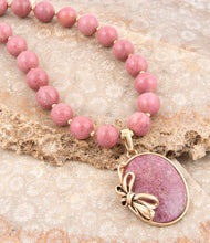 Load image into Gallery viewer, Gifted Pink Rhodonite Gold Bow Beaded Pendant Necklace