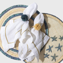 Load image into Gallery viewer, Ruffle edge straw placemat, indigo, set of four