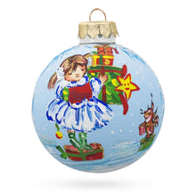 Load image into Gallery viewer, Little Girl Holding Gifts Glass Ball Christmas Ornament 3.25 Inches