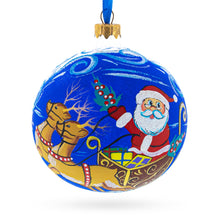 Load image into Gallery viewer, Jolly Santa Riding Sleigh with Reindeer Glass Ball Christmas Ornament 4 Inches