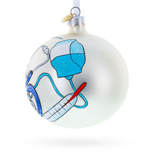 Load image into Gallery viewer, Compassionate Nurse or Doctor on Glass Ball Christmas Ornament 4 Inches