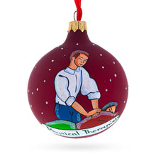 Load image into Gallery viewer, Physical Therapist Glass Ball Christmas Ornament 3.25 Inches