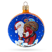 Load image into Gallery viewer, Santa Climbing Down the Chimney Glass Ball Christmas Ornament 3.25 Inches